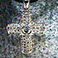 close up photo of a pendant or earring