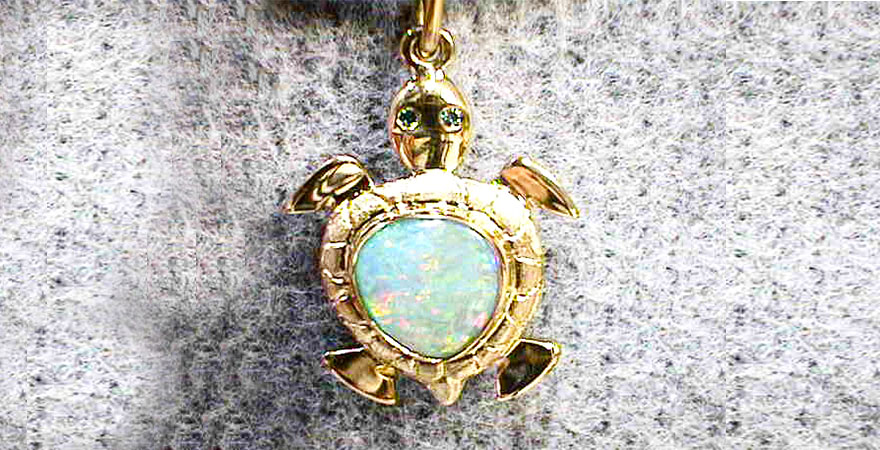 close up photo of a pendant or earring